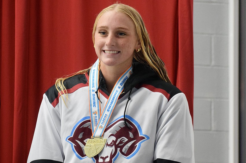 Taylor Schwenk put on one of the area's most dominant performances of 2025-26 — in any sport — with three gold medals and one silver at the FHSAA Class 4A swimming and diving state championships. Taylor Schwenk put on one of the area's most dominant performances of 2025-26 — in any sport — with three gold medals and one silver at the FHSAA Class 4A swimming and diving state championships.