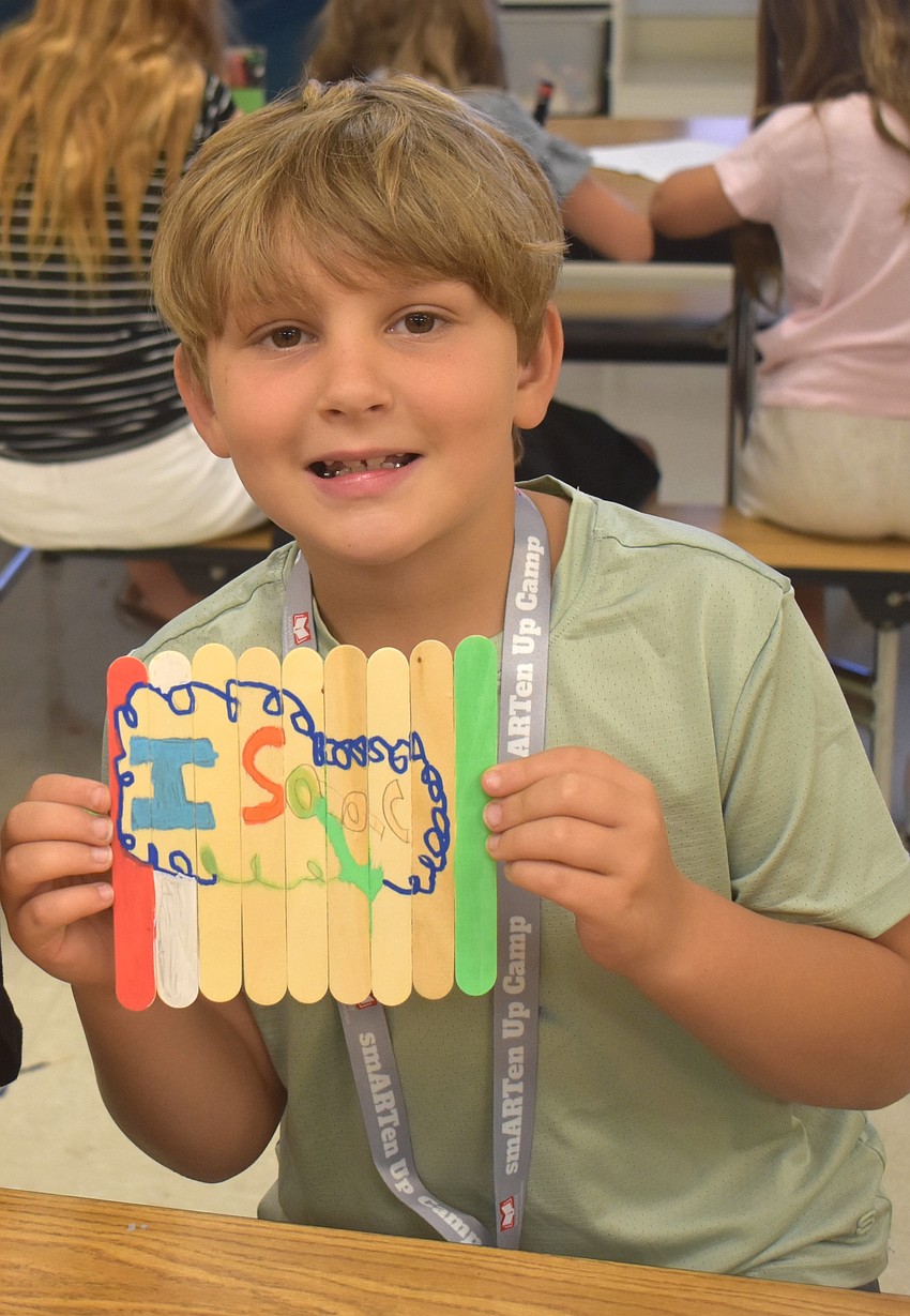 Isaac Grapentine, a rising third grader at Palma Sola Elementary, took inspiration from video games, specifically Roblox, to choose his colors and design for his project.