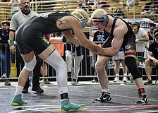 Evan Rowe (right), pictured here at the FHSAA Class 2A wrestling individual state championships from March 5-7, turned in an exceptional senior season for Braden River.