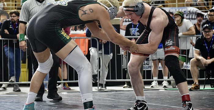 Evan Rowe (right), pictured here at the FHSAA Class 2A wrestling individual state championships from March 5-7, turned in an exceptional senior season for Braden River.