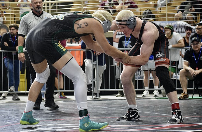 Evan Rowe (right), pictured here at the FHSAA Class 2A wrestling individual state championships from March 5-7, turned in an exceptional senior season for Braden River.