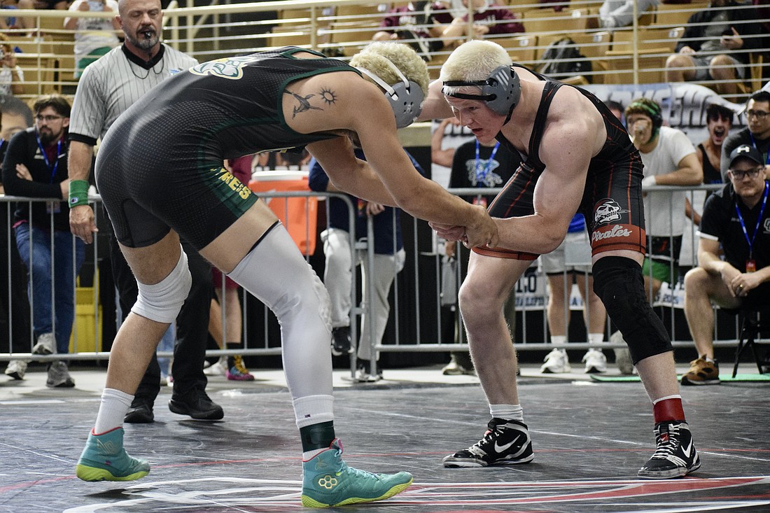 Evan Rowe (right), pictured here at the FHSAA Class 2A wrestling individual state championships from March 5-7, turned in an exceptional senior season for Braden River.