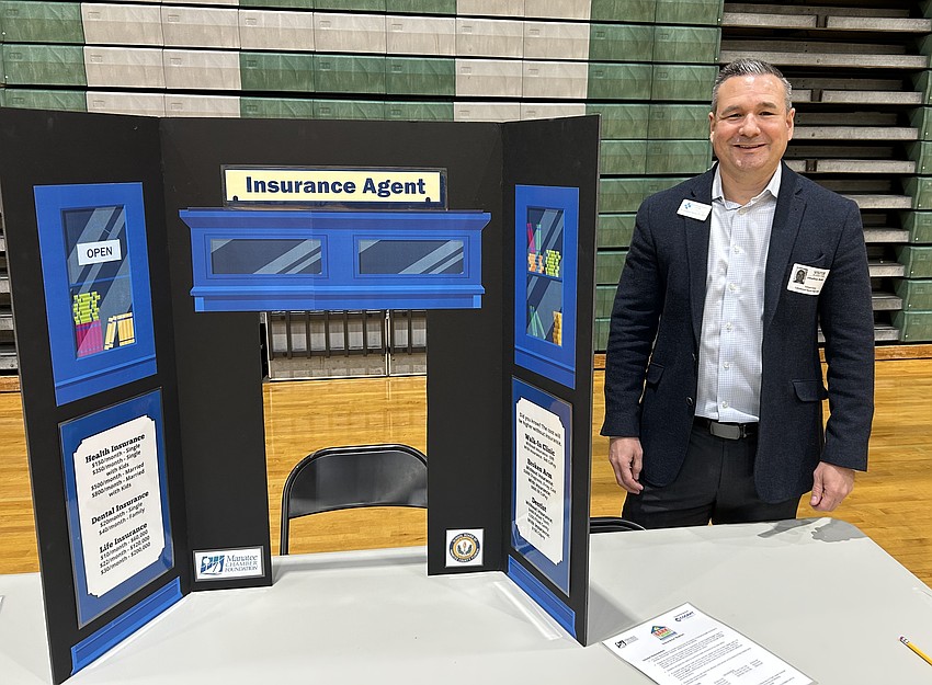 Jonathan Mullis has been involved in local schools in a variety of ways, including as a volunteer for the Manatee Chamber of Commerce's Big Bank Theory program.