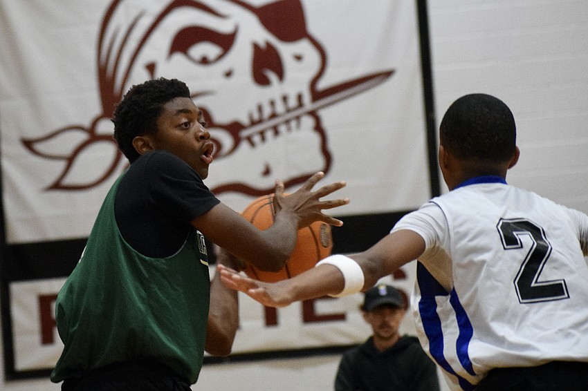 Rising junior guard Jaidon Aiken (left) had a team-high 14 points for Lakewood Ranch in its June 4 summer game against Southeast. He played on junior varsity last season, and is now working to earn his spot on varsity. Rising junior guard Jaidon Aiken (left) had a team-high 14 points for Lakewood Ranch in its June 4 summer game against Southeast. He played on junior varsity last season, and is now working to earn his spot on varsity.