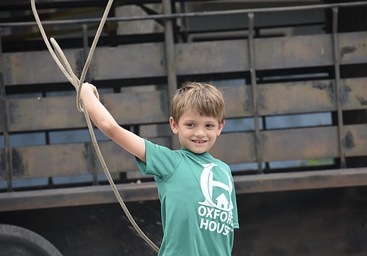 Daniel Bitter, 7, tosses the lasso.