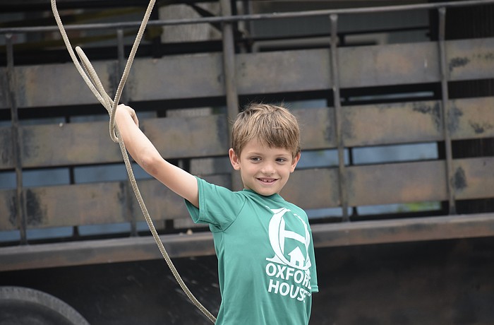 Daniel Bitter, 7, tosses the lasso.