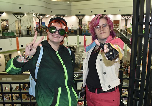 Cole Ralston and Aether Baskin enjoy the con experience.