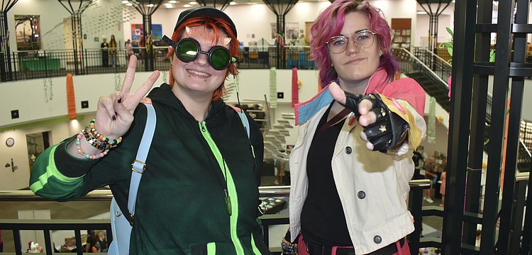 Cole Ralston and Aether Baskin enjoy the con experience.