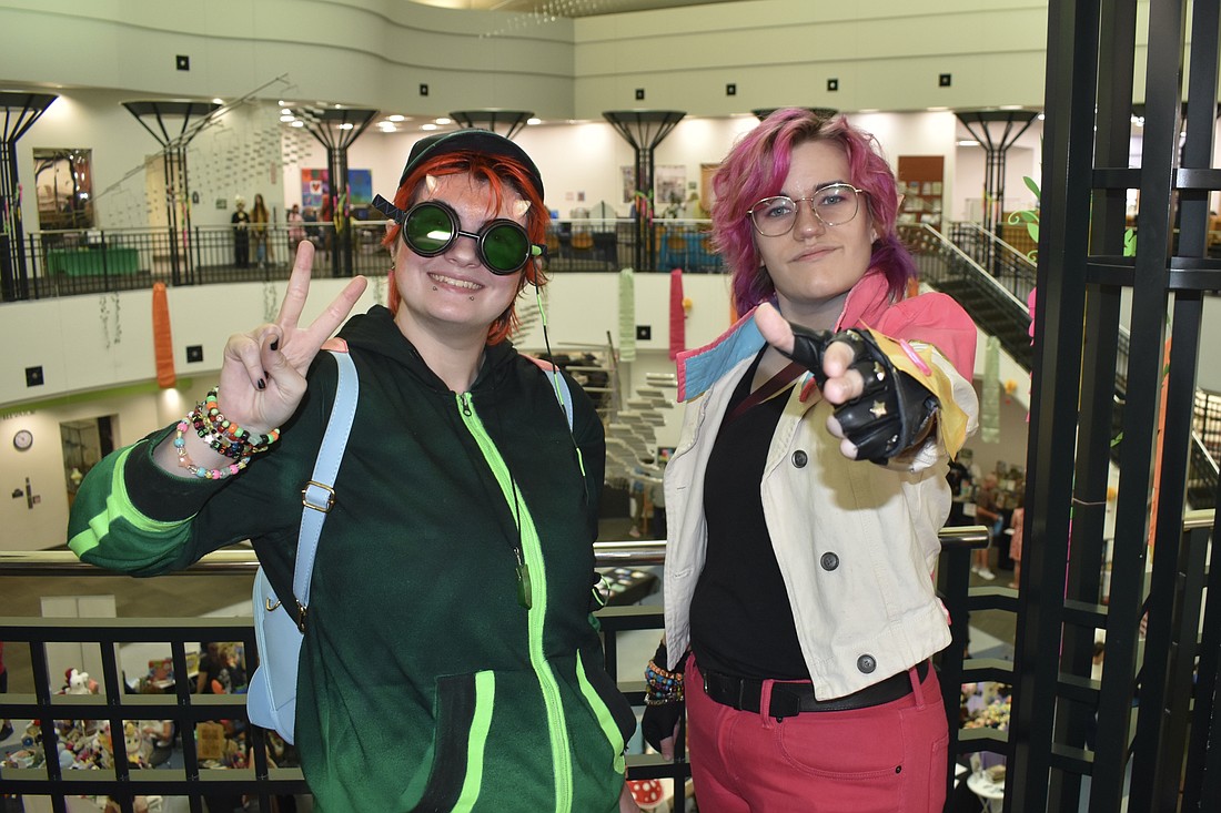 Cole Ralston and Aether Baskin enjoy the con experience.