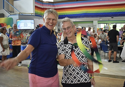 Amy Snider and Julie Waters bring some ribbon energy to the dance floor.