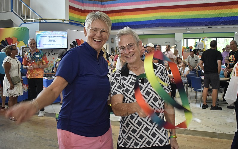 Amy Snider and Julie Waters bring some ribbon energy to the dance floor.