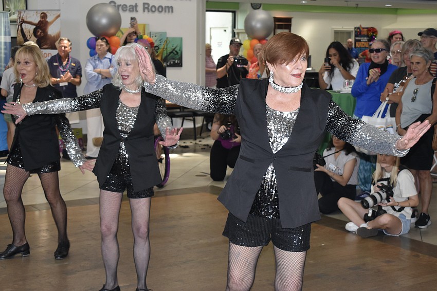 Nancy Creighton, Cherie Price and Tina Vogel of Tap Kats offer a performance.