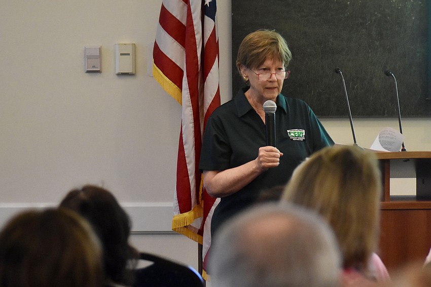 CERT Team Leader Polly Greene tells a crowd of about 100 people at Lakewood Ranch Town Hall about her experience rushing to the scene of an emergency with an AED in tow.