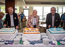 Plymouth Harbor residents Dr. Frederick "Fred" Moffat, George "Gus" Nimick and James "Jim" Griffith each cut into their cakes in a unique triple 99th birthday celebration.
