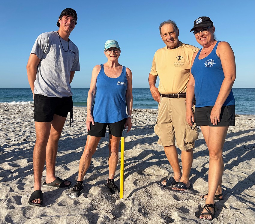 Certified volunteers Ben and Brenda Jameson, Enrico “Sam” DiGiammarino, Jr. and Connie Schindewolf conclude the first Turtle Walk of the season. Walks continue every Saturday morning through the end of July.