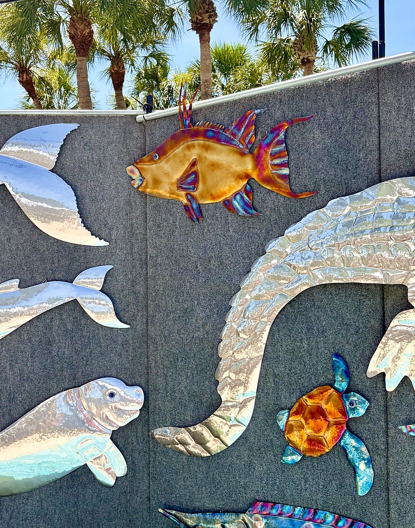 Artist John Grammer said his marine animals are inspired by his time living in the U.S. Virgin Islands. He said he appreciates getting to celebrate the beauty and surprising intelligence of hogfish and the playfulness of beloved sea turtles and manatees.