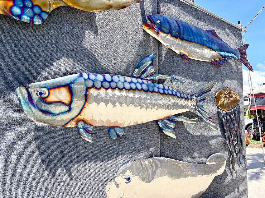 John Grammer gives the illusion of a tarpon's silvery scales with carefully hammered indents shaped like those of the iconic Floridian fish.
