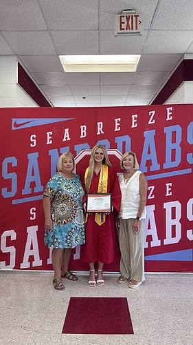 Thelma McGough, PEO STAR committee member; Lucy Kimble, Seabreeze senior; and Joni Kroll, PEO STAR committee member. Courtesy photo