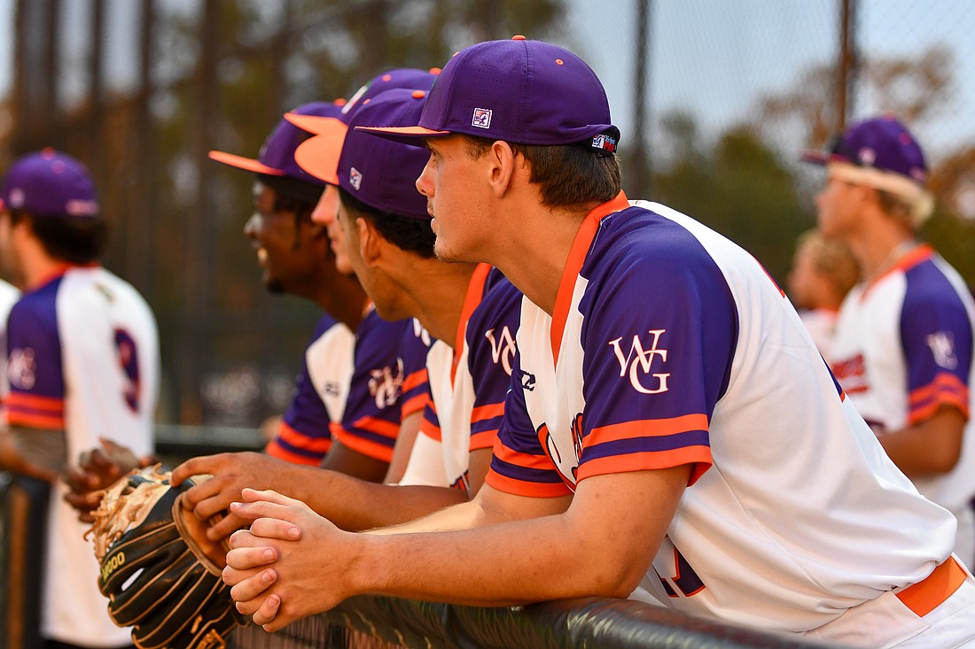 Squeeze pitcher Rylee Gibson stood in the dugout with his teammates as the sun cascaded on their jerseys that were inspired by its rays.