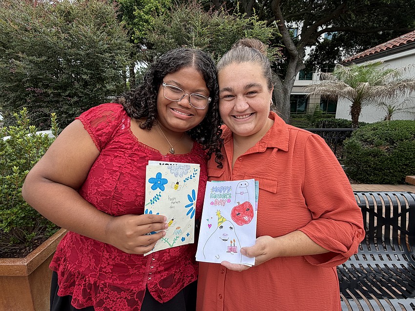 Arianna Bryant is able to spread kindness to others through her handmade cards with the help of her mother, Lacye Bryant.