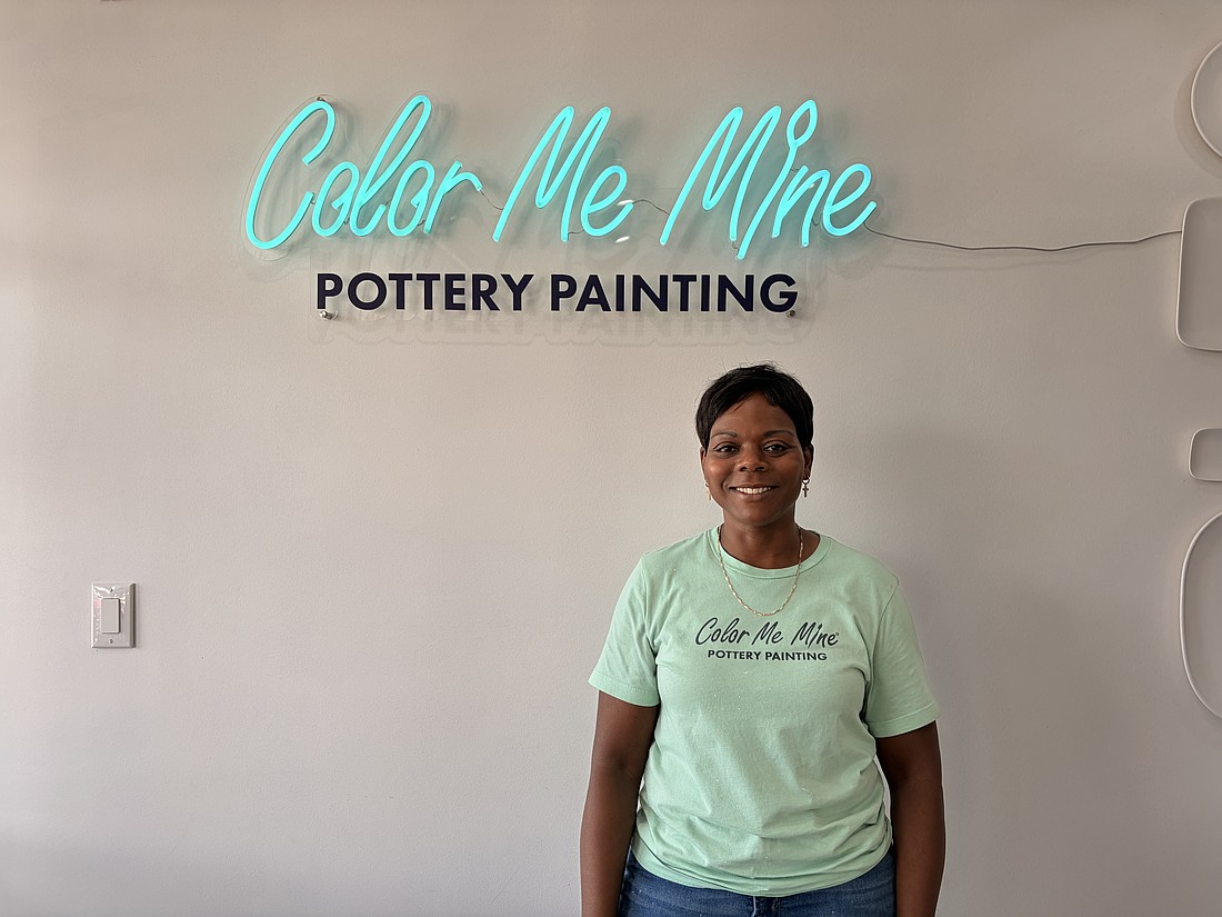 Nedy Trent is proud of her life's work, both in the Navy and at Color Me Mine.
