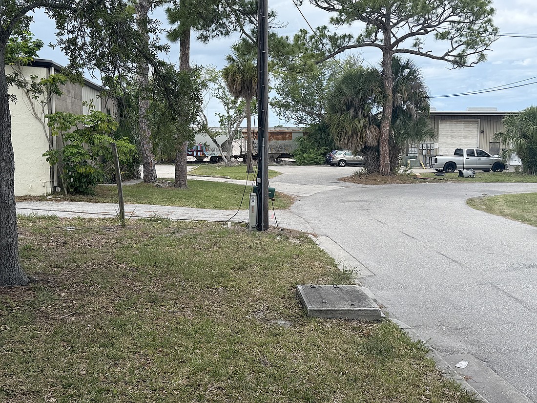 The city right of way of the alley at the end of Aspinwall Street must be vacated to allow for construction of a new Sarasota County Clerk of Courts legal document storage facility.