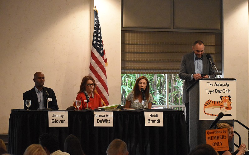 Jimmy Glover, Teresa DeWitt, Heidi Brandt speak at the forum, beside moderator Kevin Cooper.