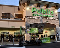 East County residents wait in line before 7 a.m. on June 11 to start shopping at the new Publix at 16642 State Road 64 East.