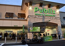 East County residents wait in line before 7 a.m. on June 11 to start shopping at the new Publix at 16642 State Road 64 East.