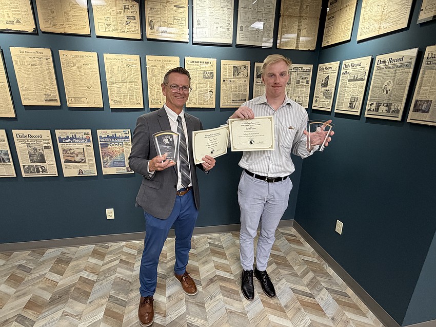 Ric Anderson, left, editor of the Jacksonville Daily Record, and staff writer Joe Lister teamed to win two first-place awards in the 2026 Florida Press Association Weekly Newspaper Contest. Anderson and Lister won for Roads & Transportation reporting and for State & Local Government Reporting. The government reporting award, also known as The TaxWatch Award, encompasses entries from all three divisions of the contest.