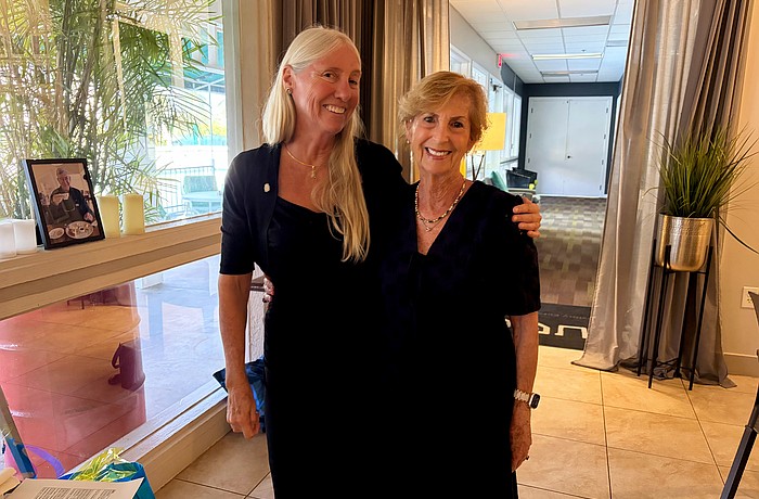 Former Rotary Club of Longboat Key President Jan Wallace congratulates current President Terri Driver, who made club history in accepting the role two years in a row at the June 11 cerermony.