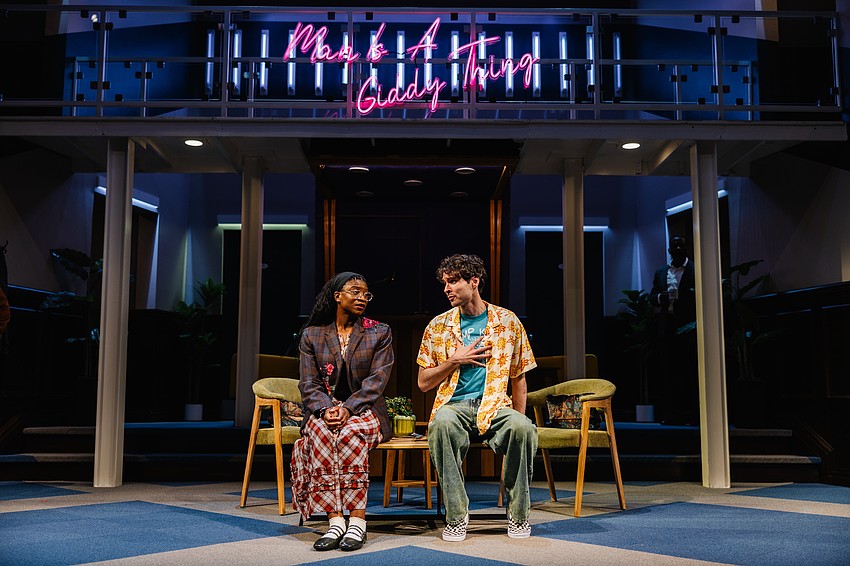 Romantasy author Alice (Brett Ashley Robinson) gives encouragement to Claudio (Ben Clark), who's struggling to stay sober, in Asolo Rep's 