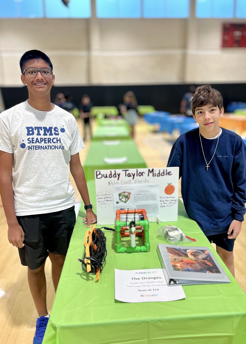 The Oranges team of Alexander Mangal and Zachary Selic present their remotely operated vehicle and Technical Design Report at the International SeaPerch Challenge. Courtesy photo The Oranges team of Alexander Mangal and Zachary Selic present their remotely operated vehicle and Technical Design Report at the International SeaPerch Challenge. Courtesy photo