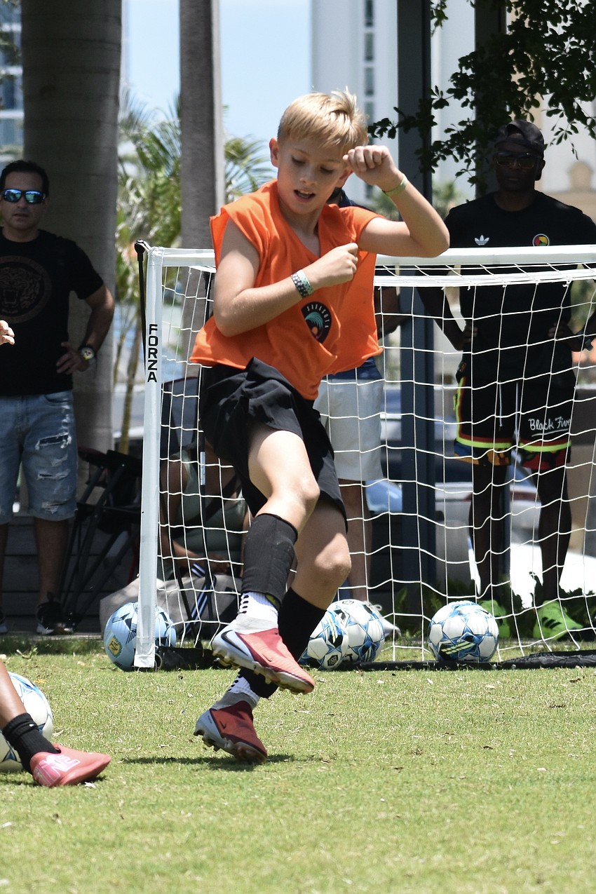Leo Burns, 11, plays in the tournament.