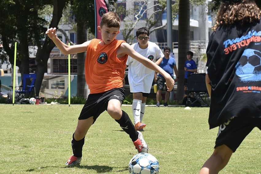 Grady Heffernan, 10, plays in the tournament.