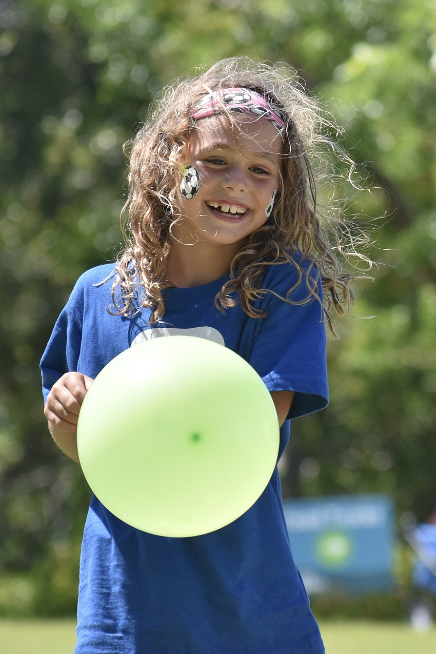 Lily Murphy, 7, plays on the field.