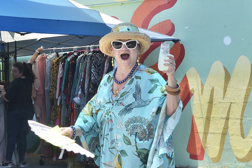 Carol Osten showcases some props.