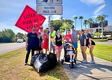 The dozen volunteers assisting the Manasota Track and Field summer cleanup on June 13 collected an estimated 75 pounds of trash from along the roadway near Longboat Key Little Beach in only an hour.