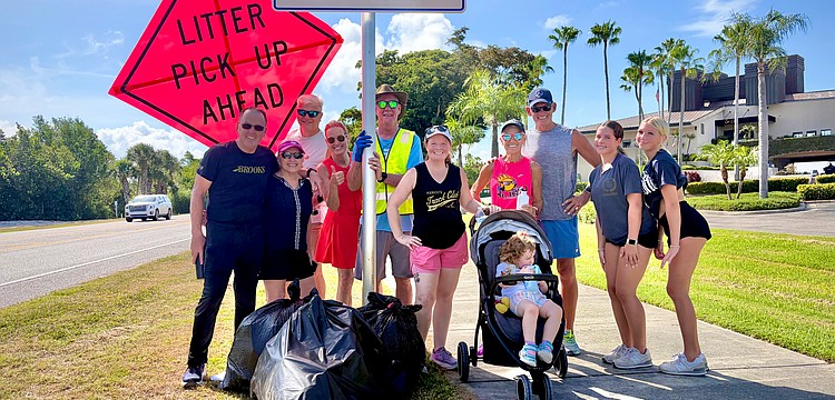 The dozen volunteers assisting the Manasota Track and Field summer cleanup on June 13 collected an estimated 75 pounds of trash from along the roadway near Longboat Key Little Beach in only an hour.
