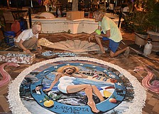 Denise Kowal and Bill Baranowski work on the infiorata.
