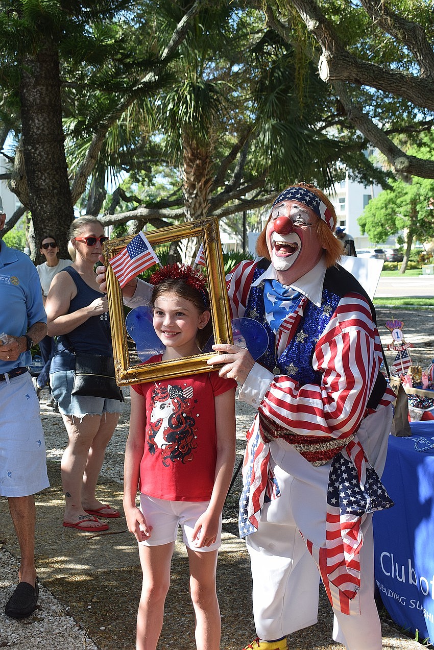 Chucko the Clown, pictured with Charlotte Hash at the 2024 Freedom Fest, is slated to return for this year's Fourth of July celebration at Bicentennial Park. Chucko the Clown, pictured with Charlotte Hash at the 2024 Freedom Fest, is slated to return for this year's Fourth of July celebration at Bicentennial Park.
