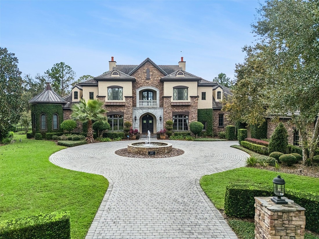 The home at 6507 Rosella Court, Windermere, sold June 9, for $6,700,000. This home features a private garden with two pools with waterfalls, grotto and waterslide, an outdoor kitchen and fireplace. The sellers were represented by Deanna Sechrest, Florida Realty Professionals.