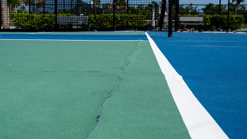 Cracks have impacted the playing surface of the town of Longboat Key’s pickleball courts at Bayfront Park. A renovation project is set to begin this week and continue through the summer. Cracks have impacted the playing surface of the town of Longboat Key’s pickleball courts at Bayfront Park. A renovation project is set to begin this week and continue through the summer.