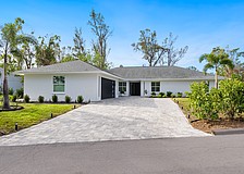 The home at 749 Tropical Circle was built in 1984 and has three bedrooms, two-and-a-half baths, a pool and 2,598 square feet of living area.