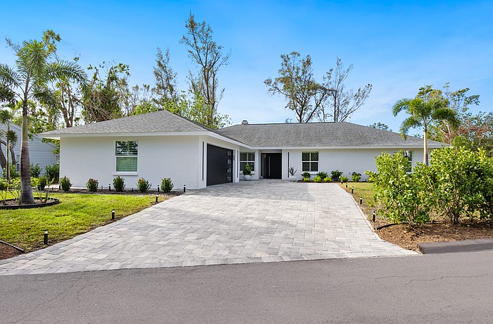 The home at 749 Tropical Circle was built in 1984 and has three bedrooms, two-and-a-half baths, a pool and 2,598 square feet of living area.