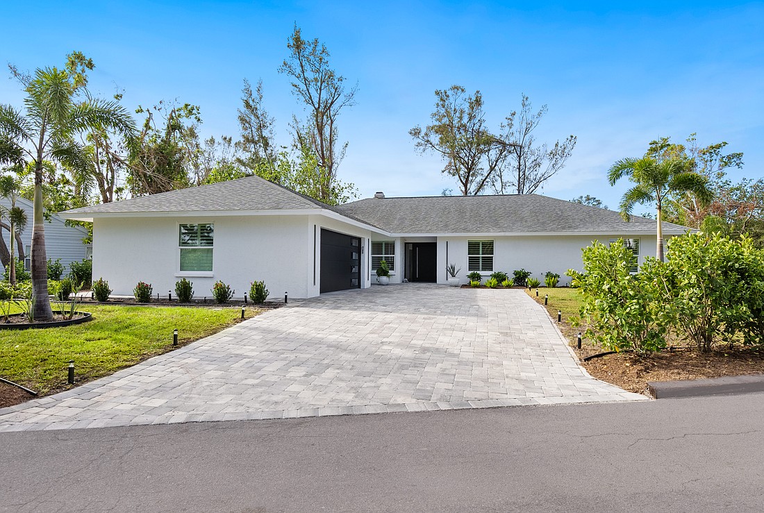 The home at 749 Tropical Circle was built in 1984 and has three bedrooms, two-and-a-half baths, a pool and 2,598 square feet of living area.