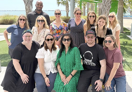 Sarasota Performing Arts Foundation Tania Castroverde Moskalenko (center) has built a staff of 17, including these members of the team.