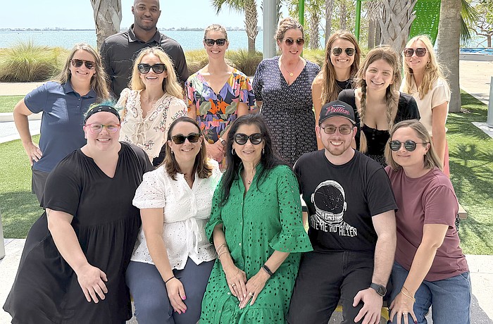 Sarasota Performing Arts Foundation Tania Castroverde Moskalenko (center) has built a staff of 17, including these members of the team.