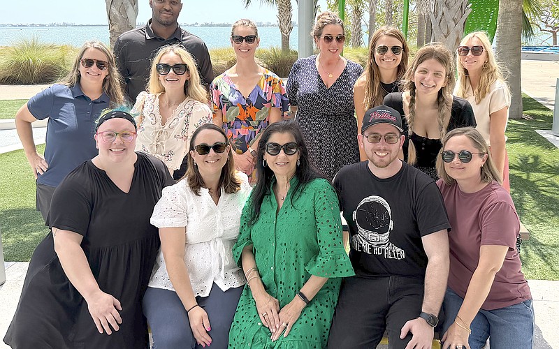 Sarasota Performing Arts Foundation Tania Castroverde Moskalenko (center) has built a staff of 17, including these members of the team.