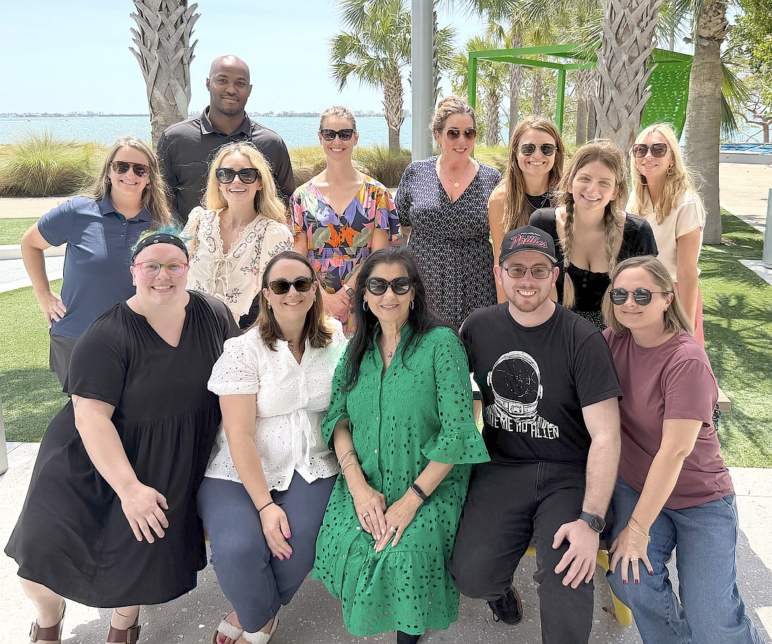 Sarasota Performing Arts Foundation Tania Castroverde Moskalenko (center) has built a staff of 17, including these members of the team.